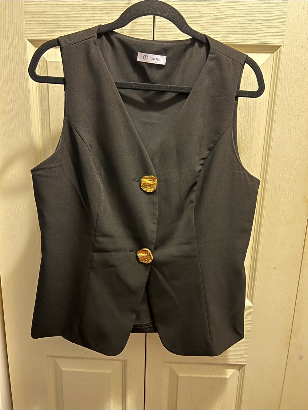 Black Sleeveless Button Vest with Gold Accent Buttons